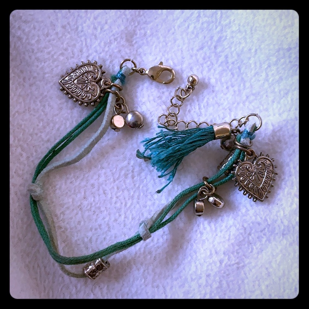 Green bracelet with charms